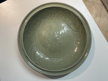 Two Chinese Longquan celadon dishes with underglaze design, Ming